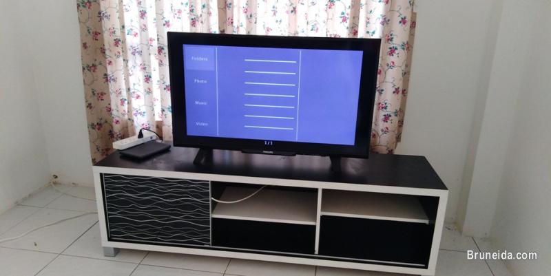 40" LED Flat screen TV (with cabinet) - image 1