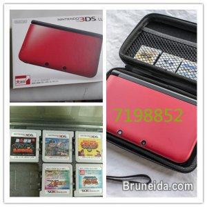3ds xL nitendo with 6 pcs 3ds game - image 2