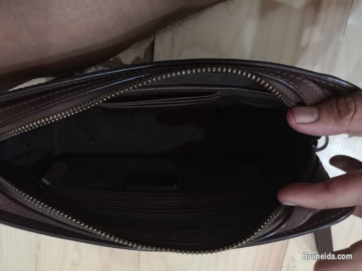 braun buffel clutch bag